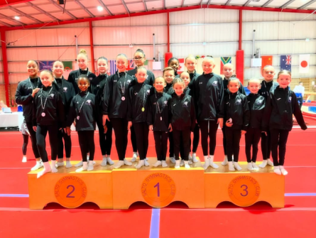 Gymnasts on podium